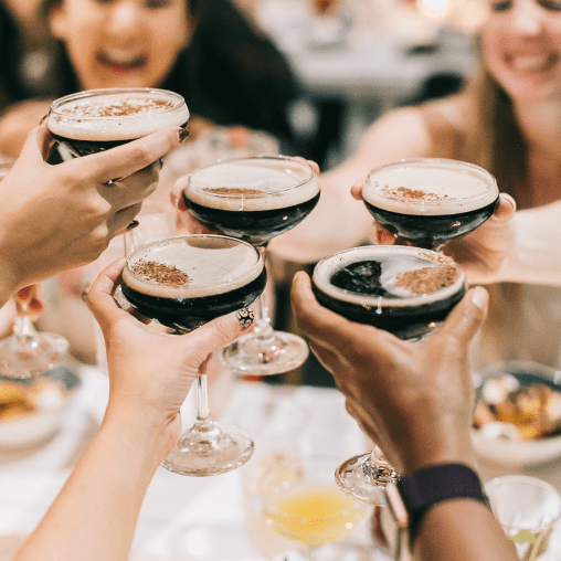 Five glasses of espresso martinis in American Social.